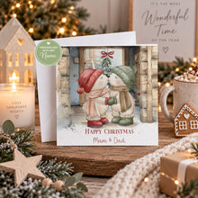 Load image into Gallery viewer, Cosy Christmas lifestyle scene featuring personalised festive couple card