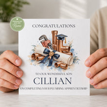 Load image into Gallery viewer, Personalised plumbing apprenticeship graduation card with pipes, spanner, diploma and graduation cap