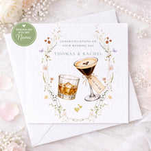 Load image into Gallery viewer, Personalised wedding congratulations card with stout and champagne, floral border and couple names

