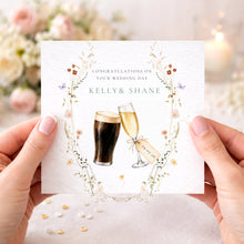 Load image into Gallery viewer, Personalised Irish wedding congratulations card with stout and champagne glasses, floral border and wedding date
