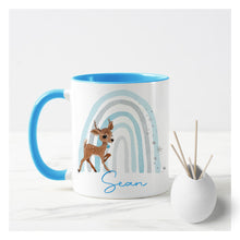 Load image into Gallery viewer, Baby Reindeer Blue Rainbow Christmas Mug
